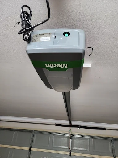 Brisbane Roller Doors technician repairing a garage door